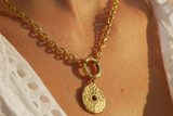 Vela Gold Sunburst Pendant Necklace