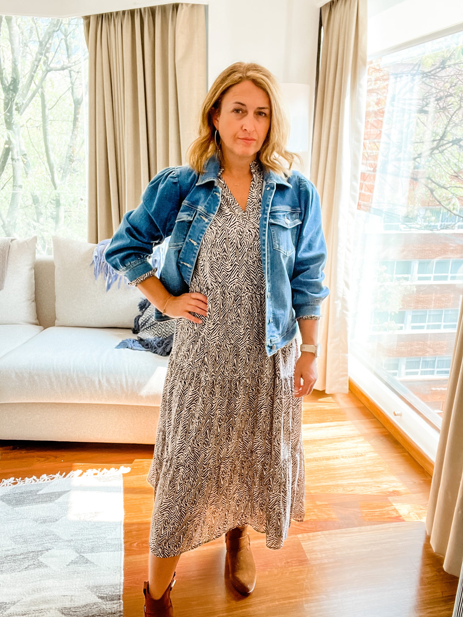 black midi dress with denim jacket Trend Alert: Black Dress + Denim Jacket